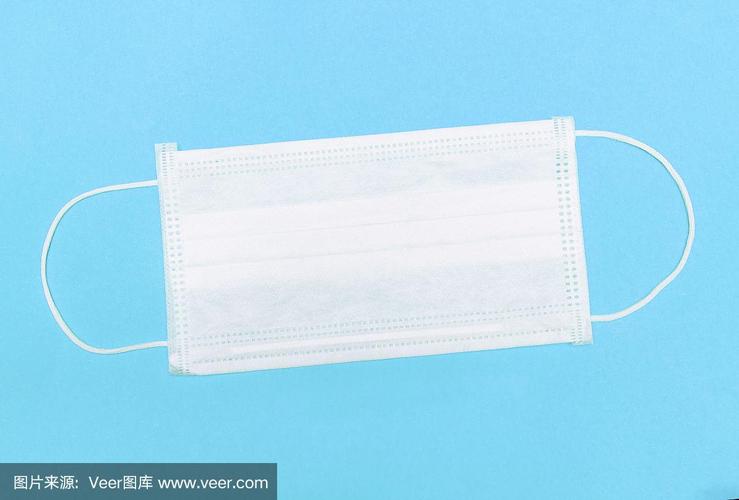 医用口罩,红色背景,俯视图.预防的面具